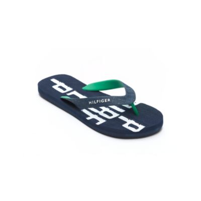 RUBBER FLIP FLOPS $20.00