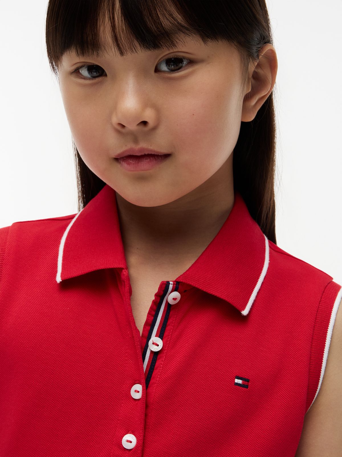 Kids' Sleeveless Pleated Polo Dress — Primary Red