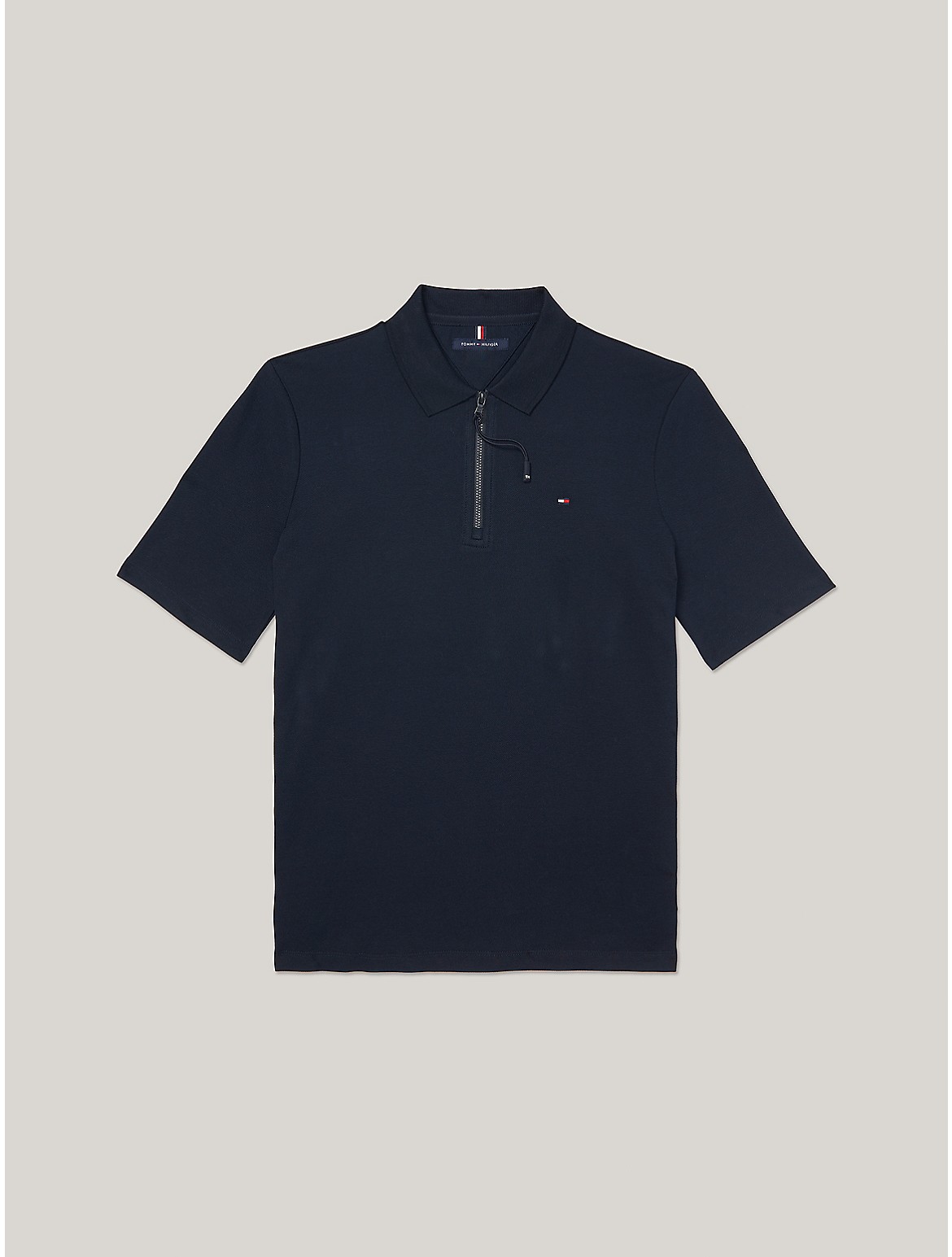 Shop Tommy Hilfiger Solid Zip Polo In Navy