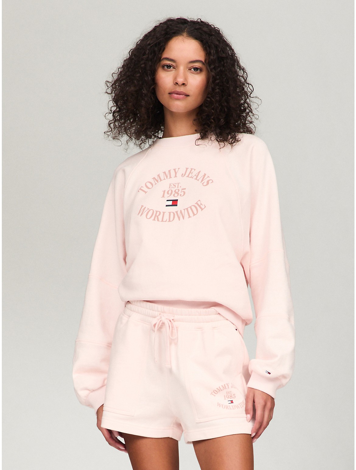 Shop Tommy Hilfiger Tj Worldwide Logo Raglan Sweatshirt In Pink Dream