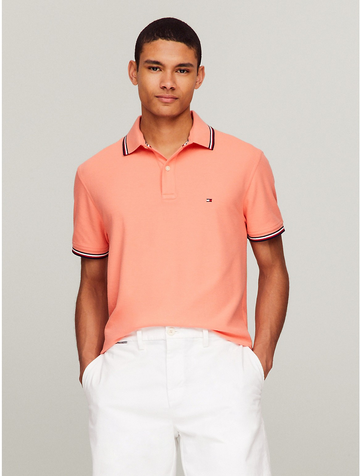Tommy Hilfiger Regular Fit Tommy Wicking Polo In Orange