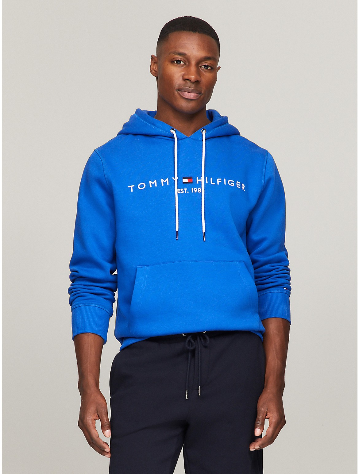 Shop Tommy Hilfiger Embroidered Tommy Logo Hoodie In Kettle Blue