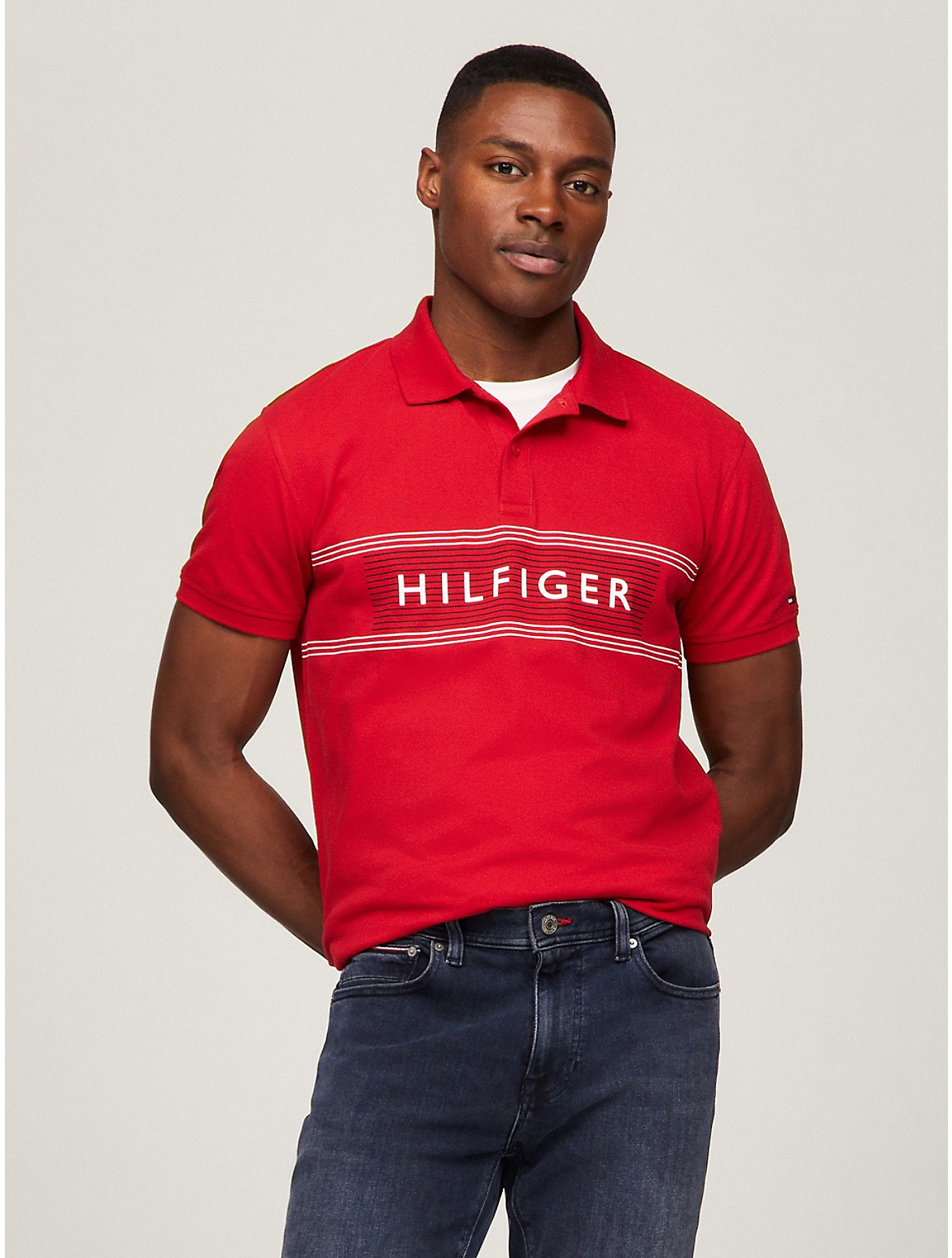 Shop Tommy Hilfiger Regular Fit Hilfiger Chest Stripe Polo In Primary Red