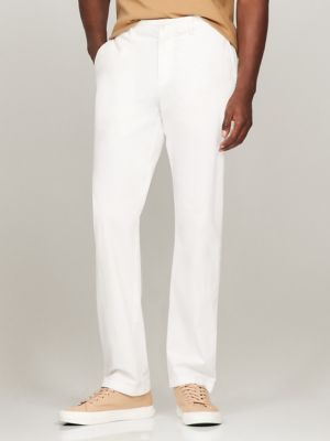 man wearing white trousers