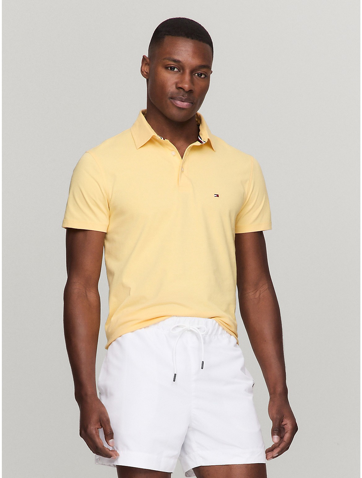 Shop Tommy Hilfiger Slim Fit Weekend Polo In Daisy Yellow
