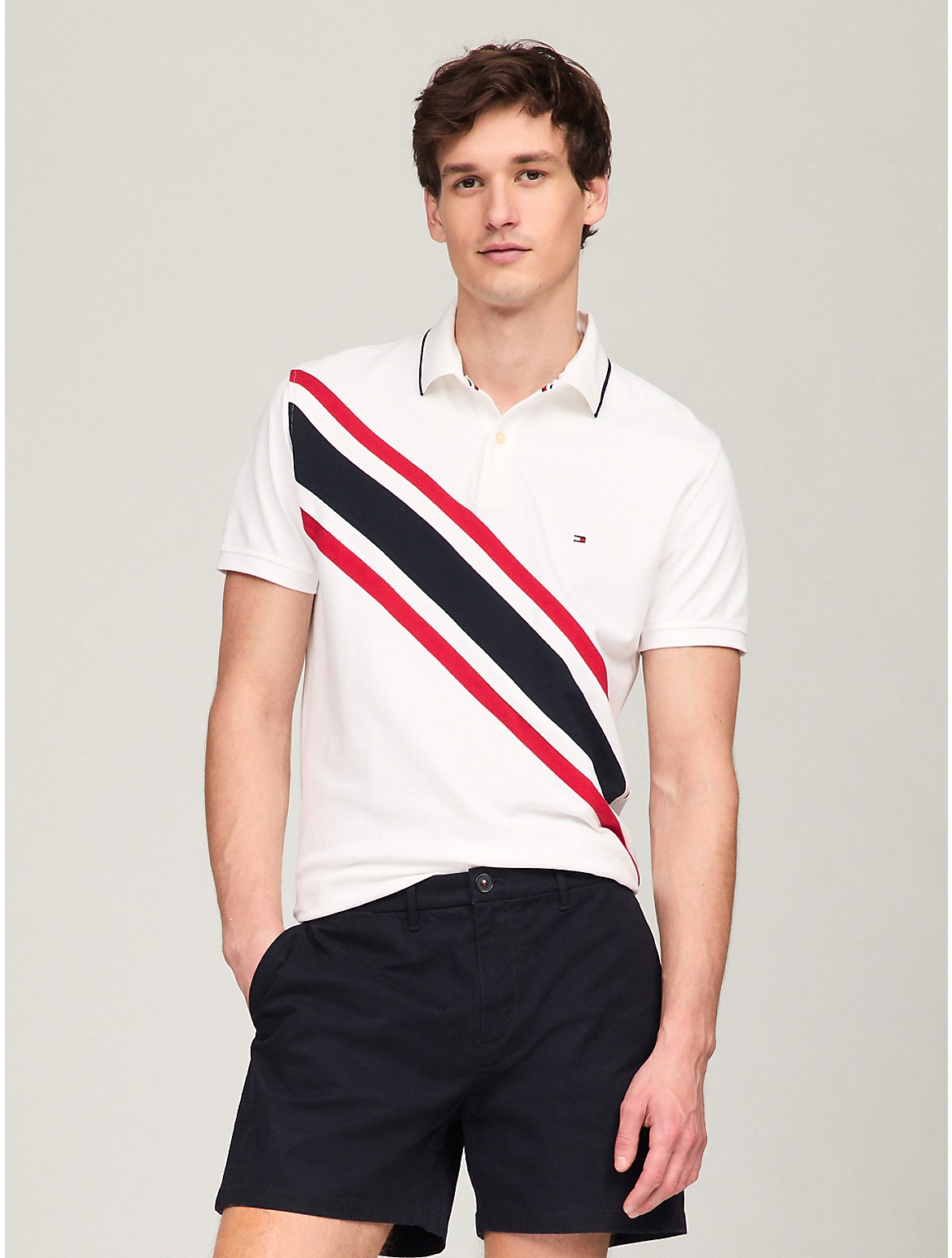 Shop Tommy Hilfiger Regular Fit Banner Stripe Polo In Optic White