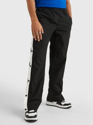 Track pants with buttons on sales the side