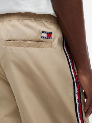 Мужские джинсы Tommy Hilfiger Tommy Jeans Logo Tape Track Pant — фото 3