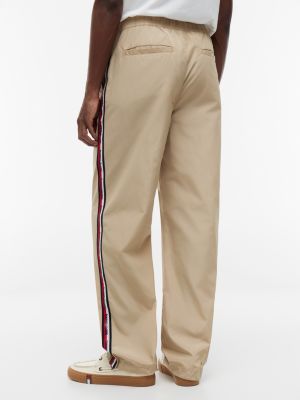Мужские джинсы Tommy Hilfiger Tommy Jeans Logo Tape Track Pant — фото 5