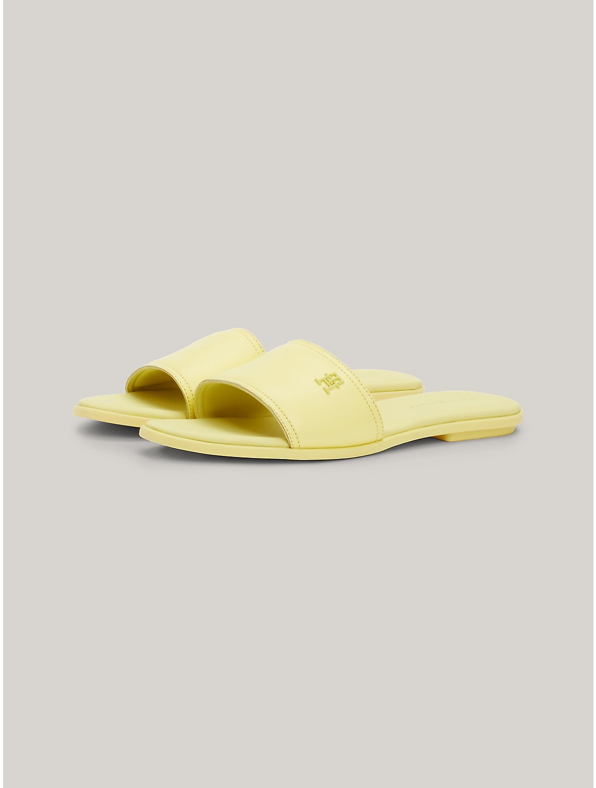Shop Tommy Hilfiger Th Logo Leather Slide In Yellow Tulip