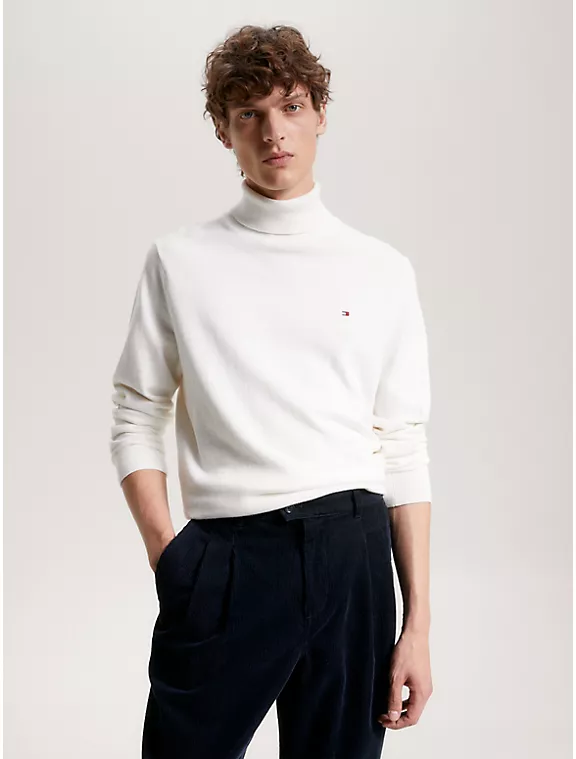 man wearing ancient white colored cotton cashmere turtleneck sweater