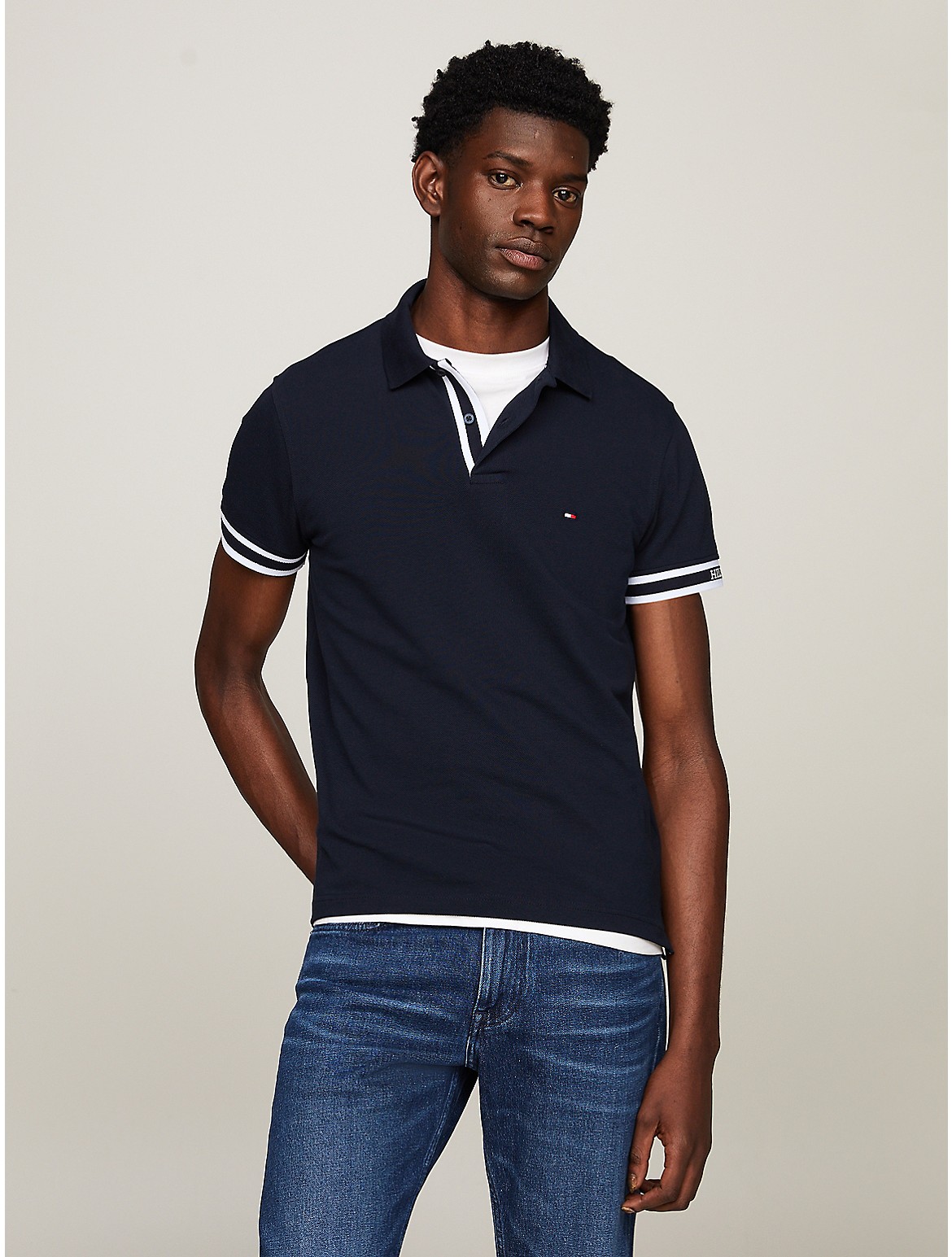 Shop Tommy Hilfiger Slim Fit Monotype Cuff Polo In Navy
