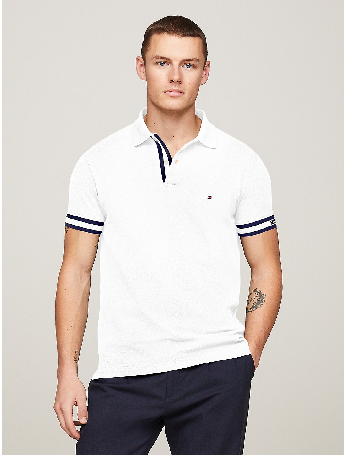 Shop Tommy Hilfiger Slim Fit Monotype Cuff Polo In White
