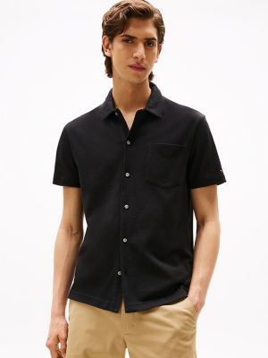 Polo en tricot boutonné, coupe régulière, noir