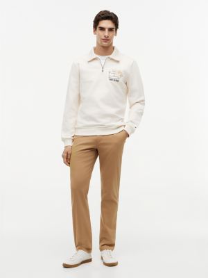 Мужские худи Tommy Hilfiger Floral Logo Quarter-Zip Polo Sweatshirt — фото 2