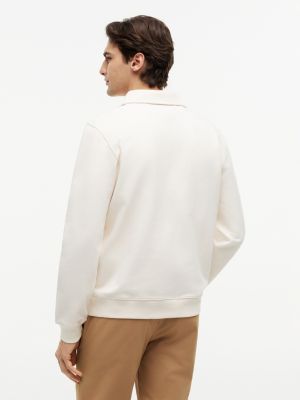Мужские худи Tommy Hilfiger Floral Logo Quarter-Zip Polo Sweatshirt — фото 4