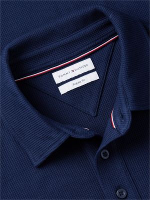 Мужское поло Tommy Hilfiger Regular Fit Short-Sleeve Waffled Polo, цвет: Карбоновый тёмно-синий — фото 6