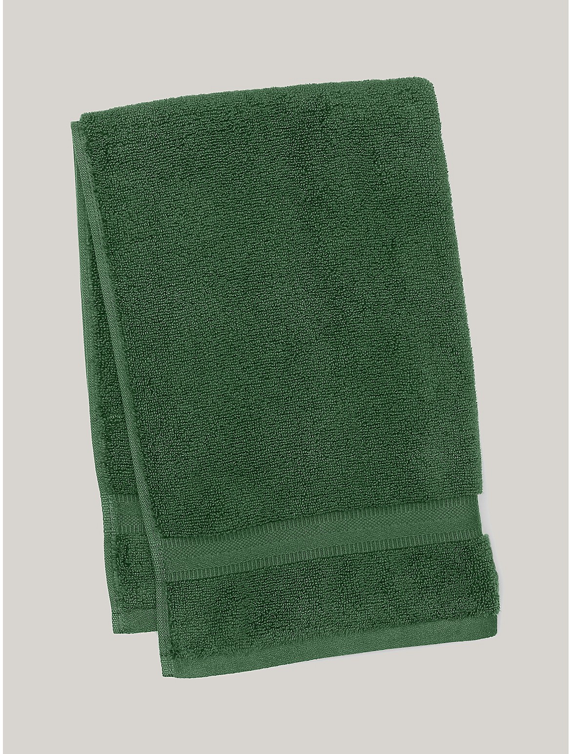 Tommy Hilfiger Signature Solid Hand Towel in Pine Needle - Green
