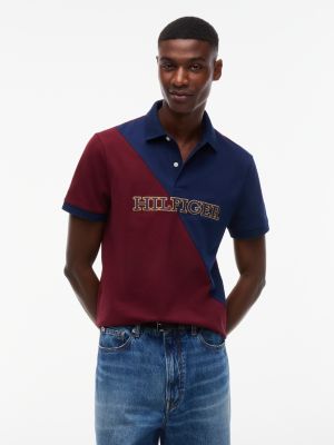 Мужское поло Tommy Hilfiger Regular Fit Diagonal Colorblock Polo, цвет: Красный / Карбоновый тёмно-синий — фото 1