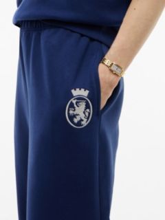 Varsity Crest Brushed-Back Sweatpant — Preppy Navy 3
